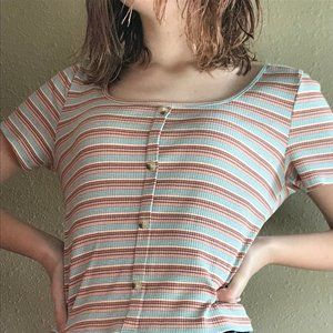 Striped blue, red and white top.